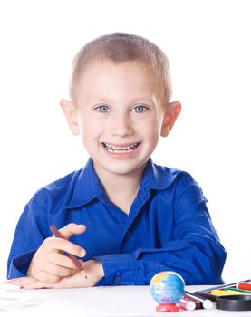 Portrait of a smiling student with a pencil isolated on a white background