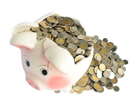Pink piggy bank broken with money isolated on white background
