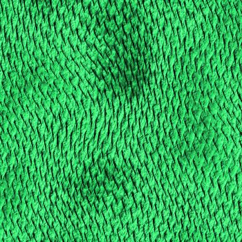 a large image of green shiny dragon scales or hide