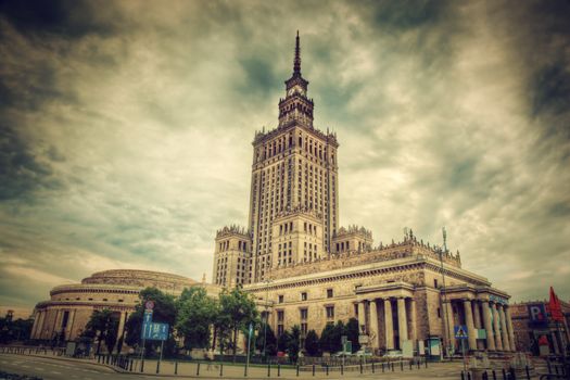 The Palace of Culture and Science, one of the symbols of Warsaw, Poland. Retro, vintage style. Palac Kultury i Nauki
