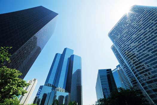 Business skyscrapers, sunny blue sky. La Defense financial district in Paris, France.