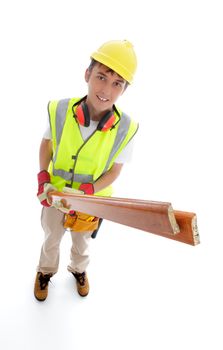 Young apprentice trainee builder or carpenter holding timber and smiling.  White background.