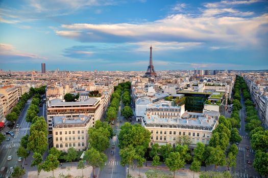 Rooftop view on the Eiffel Tower from Arc de Triomphe. Sunny day, blue sky. Tour Eiffel