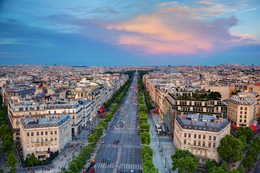 View on Avenue des Champs-Elysees from Arc de Triomphe at sunset, Paris, France