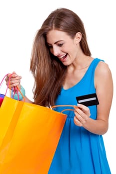 happy young woman with colorful shopping bags visa credit card isolated