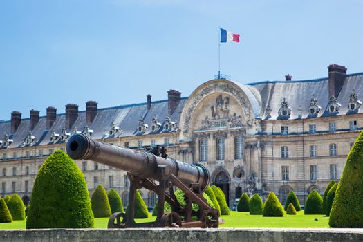Historic cannon in the garden next to Les Invalides museum in Paris, France