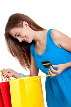 happy young woman with colorful shopping bags visa credit card isolated