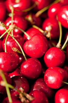 sweet red cherry closeup macro on market outdoor summer