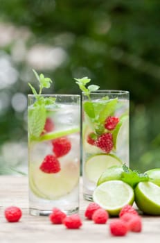 fresh cold drink water ice cubes peppermint lime raspberry outdoor summer