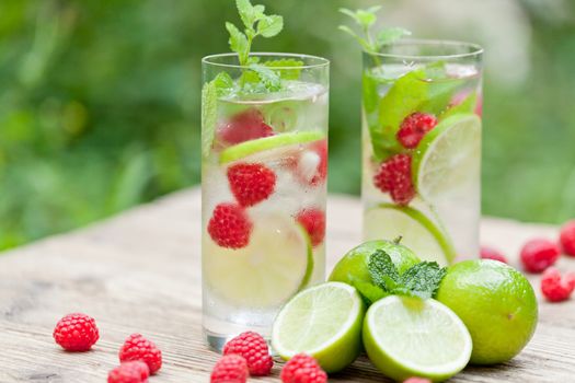 fresh cold drink water ice cubes peppermint lime raspberry outdoor summer