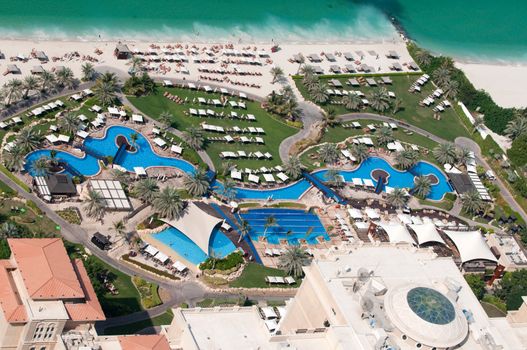 Pool and beach area of the luxury hotel in Dubai Marina, United Arab Emirates