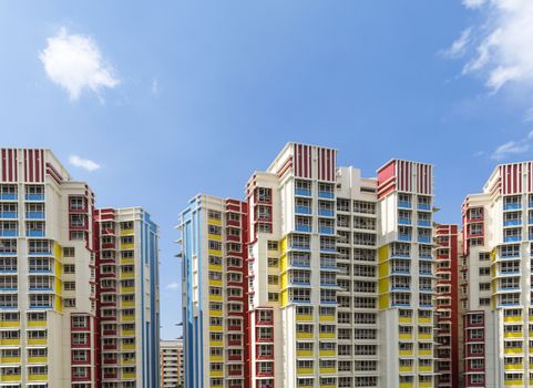 A group of high rise colorful residential apartments.