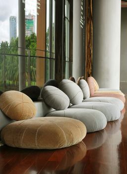 Cushion seat in quiet interior room for meditation