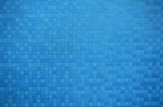 abstract blue wall with small squares and lines in it backdrop background.