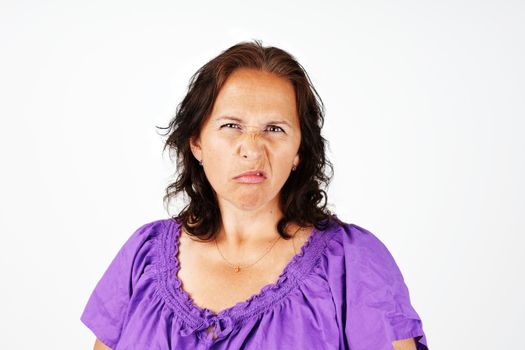 Grumpy, irritated and upset middle aged woman