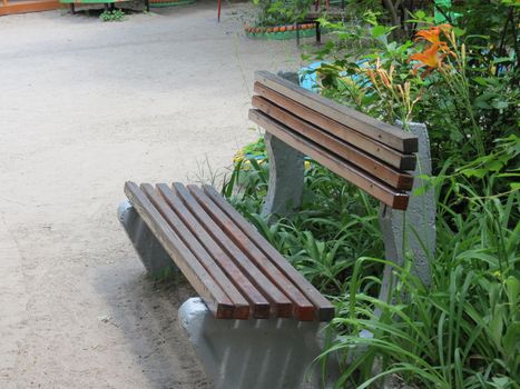   A bench for rest on one of the sites in kindergarten                             