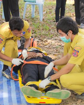 PHRAE,THAILAND - DECEMBER 20 : Unidentified  men are first aid training from staff  the hospital on  December 20, 2012 at local parks, Muang, Phrae, Thailand.