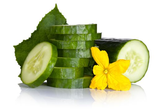 Fresh cucumber with leaf and flower on white background. Macro shot