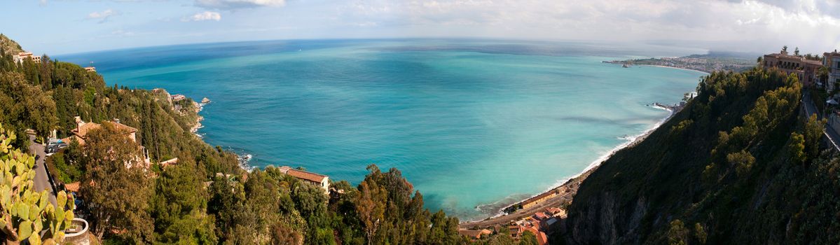 Beautiful coast of Sicily. Panoramic View from Taormina, famous tourist resort, the most luxury town on Sicilian coastline, Sicily, Italy