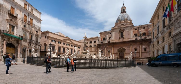 Palermo, Italy - May 2, 2011: Crowds of tourists visit piazza Pretoria, one of the main sight in Palermo. Sicily, Italy
