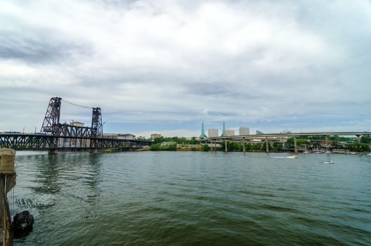 View of the Willamette River in Portland, Oregon with the Steel Bridge visible