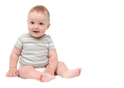 beautiful laughing baby boy sitting on white background