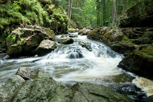 czech mountain creek Doubrava in Czech Republic with slow shutter speed