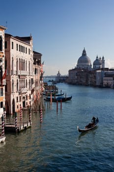 Gondola with gondolier on Grand Channel in Venice