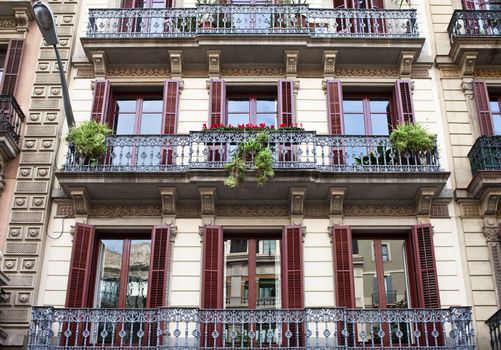 Housefront with windows and balcony.Barcelona