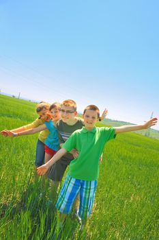 kids play in wheat field