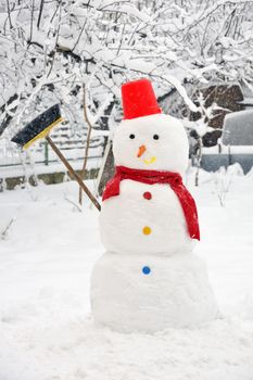 snowman on snowy garden