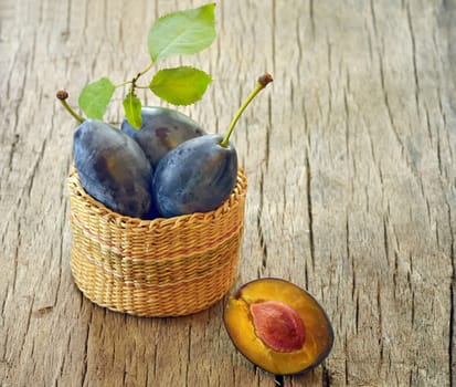 plums in the basket