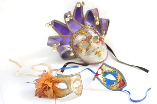three Venetian masks for a party on a white background