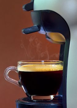 Espresso pouring into a cup