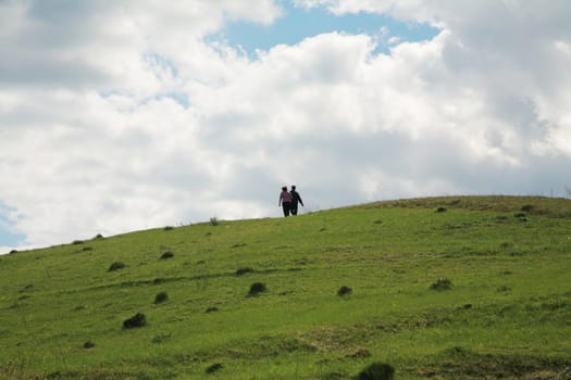 The man and the woman on a hill