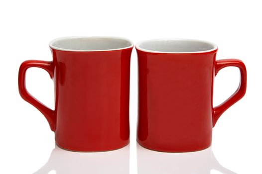 Two red cups on a white background