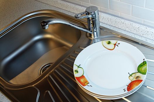 Pure plates on a new kitchen sink