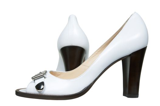 White female shoes on a white background