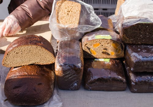 healthy ecologic natural bread loaf sell in outdoor street market fair. diet nutrition food.