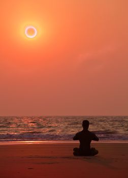 Yoga on the beach in India  Sitting asana