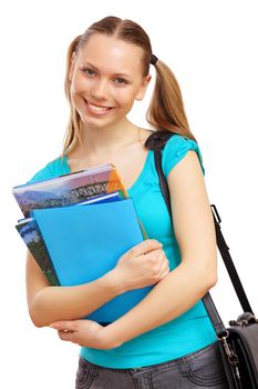 Happy smiling student standing and holding books