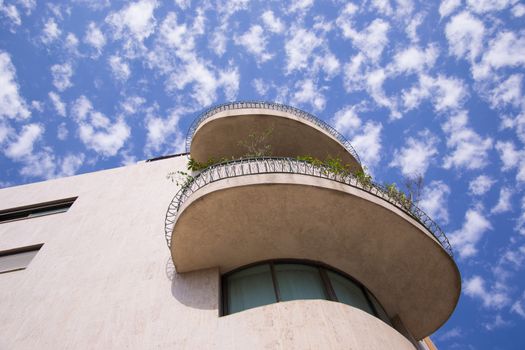 Building against cloudy blue sky