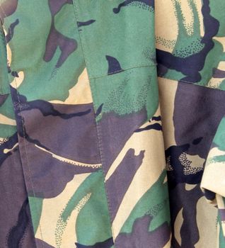 Abstract background of military khaki uniform.