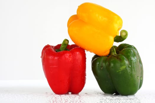 three fresh sweet pepper isolated and white blackgroung