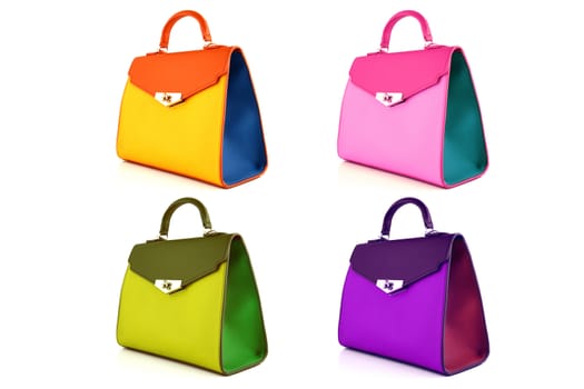 Set of multicolored female bags on a white background