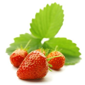 Strawberry with leaves isolated on white background