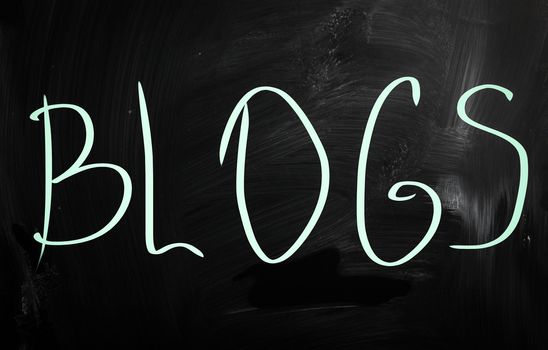 "Blogs" handwritten with white chalk on a blackboard