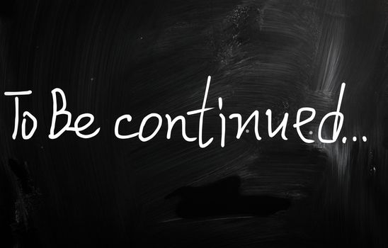 "To be continued" handwritten with white chalk on a blackboard