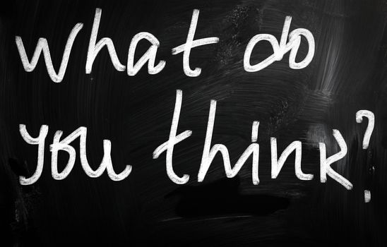 "What do you think?" handwritten with white chalk on a blackboard