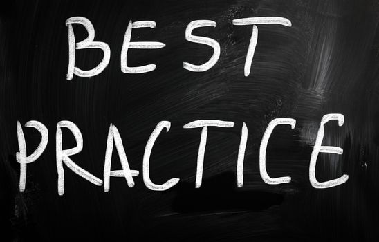 "Best practice" handwritten with white chalk on a blackboard